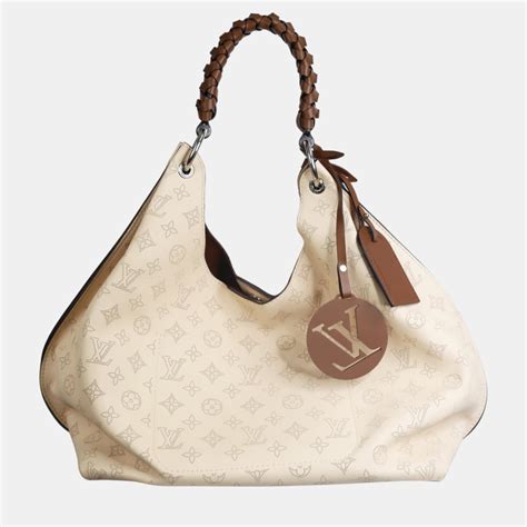 louis vuitton purse cream|louis vuitton mahina bag price.